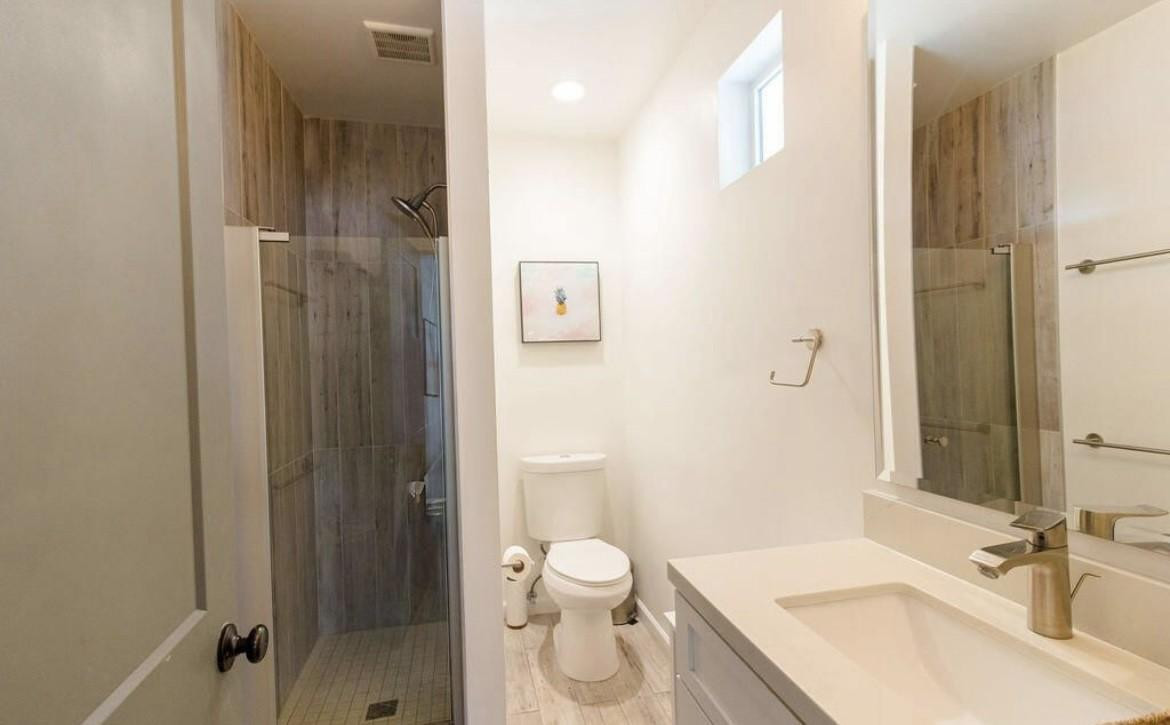 4214 North 20th Street Phoenix, AZ 85016 - Photo 23 of 40 a bathroom with a sink toilet and shower