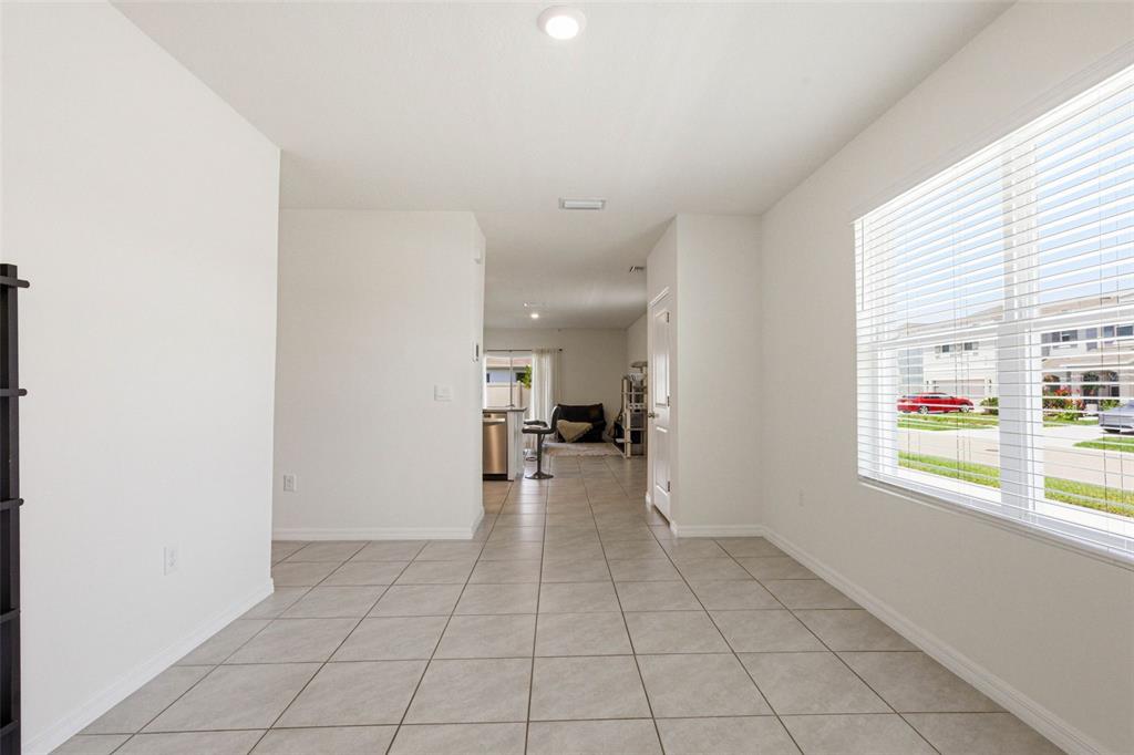 2959 Common Fig Run Wesley Chapel, FL 33543 - Photo 6 of 36 a view of a kitchen with a sink and a window