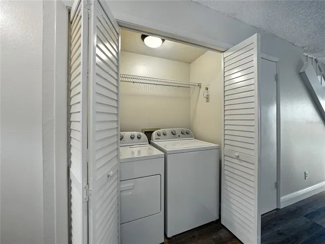 a view of entryway with wooden floor