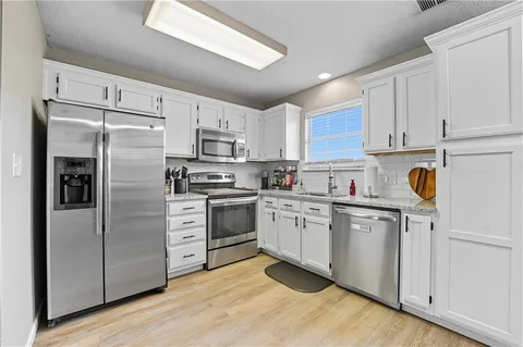 $205,000 | 5623 Northwest Sunrise Meadow Circle, Lee's Summit, MO 64064