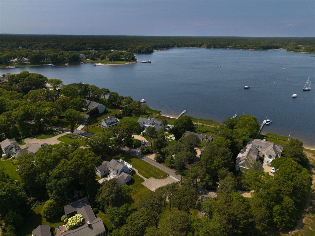 47 Great Bay Road Osterville, MA 02655 - Photo 1 of 38 a view of a lake with a city