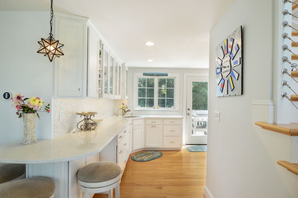 47 Great Bay Road Osterville, MA 02655 - Photo 13 of 38 a bathroom with a sink a toilet and a window
