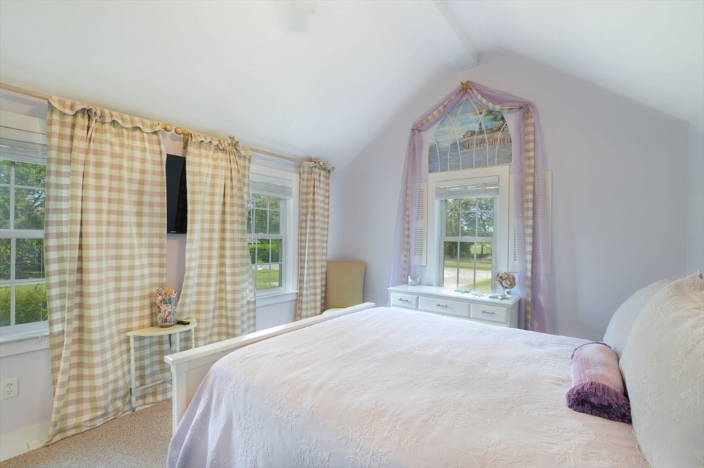 47 Great Bay Road Osterville, MA 02655 - Photo 23 of 38 a bedroom with a bed and a large window
