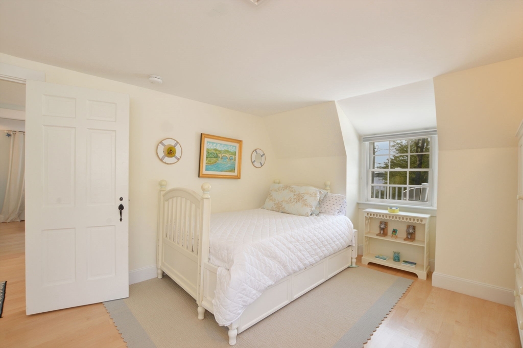 47 Great Bay Road Osterville, MA 02655 - Photo 24 of 38 a bedroom with a bed and a window
