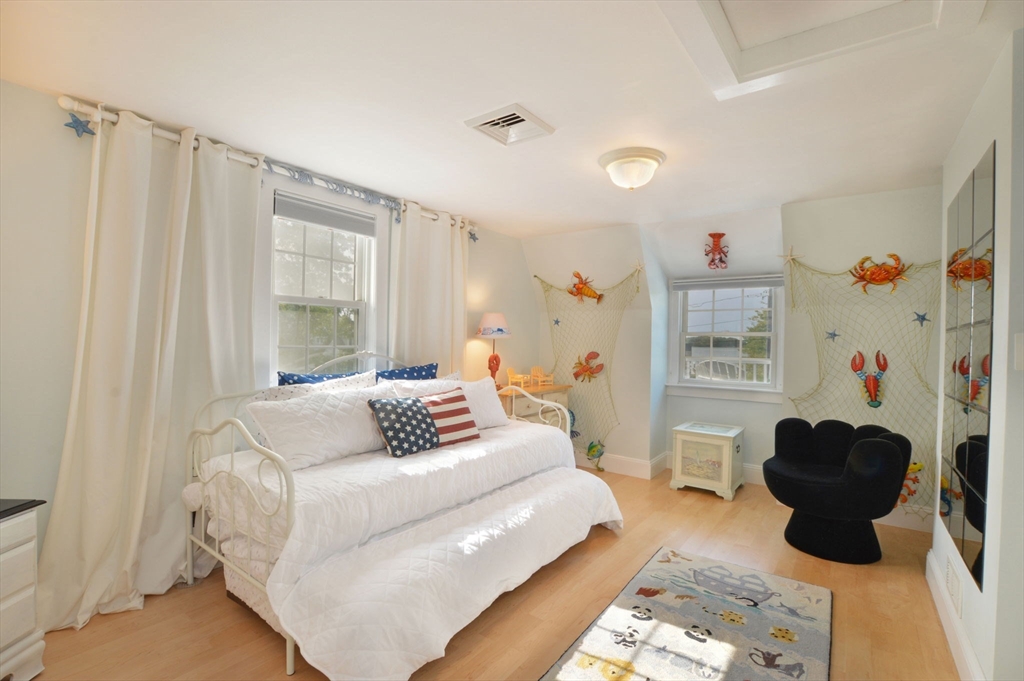 47 Great Bay Road Osterville, MA 02655 - Photo 25 of 38 a bedroom with a bed couch and a window