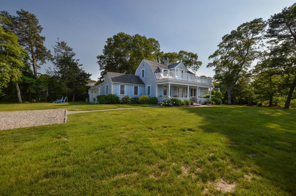 47 Great Bay Road Osterville, MA 02655 - Photo 5 of 38 a view of a house with a big yard