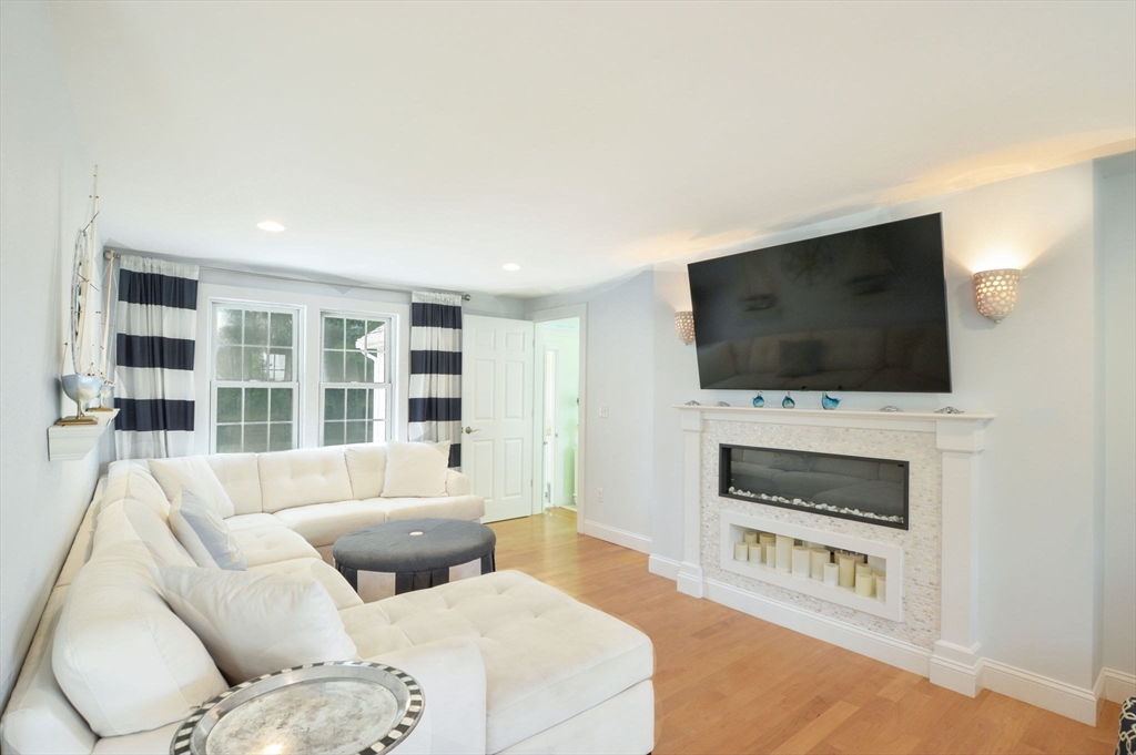 47 Great Bay Road Osterville, MA 02655 - Photo 10 of 38 a living room with furniture and a flat screen tv