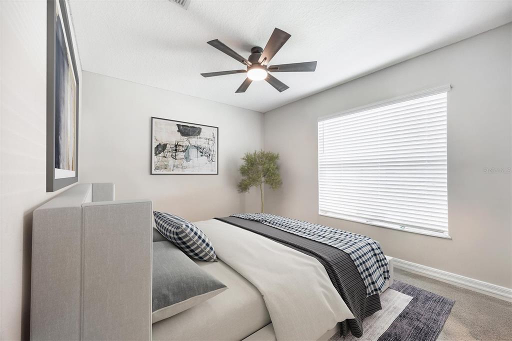 9217 Southwest 58th Circle Ocala, FL 34476 - Photo 15 of 21 a bedroom with a bed and window