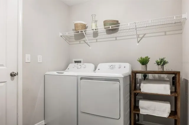 a utility room with dryer and washer