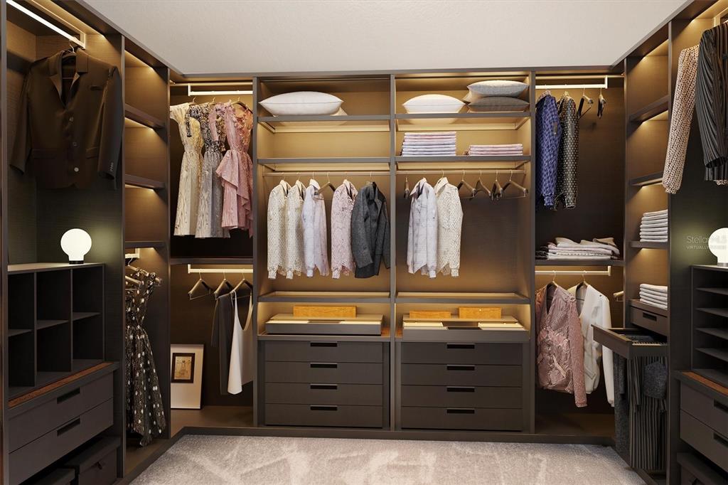 9217 Southwest 58th Circle Ocala, FL 34476 - Photo 3 of 21 a view of walk in closet with clothes and shoes