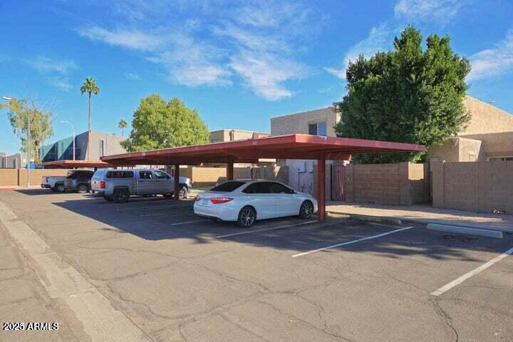 600 South Dobson Road, Unit 69 Mesa, AZ 85202 - Photo 20 of 24 a view of street with parked cars