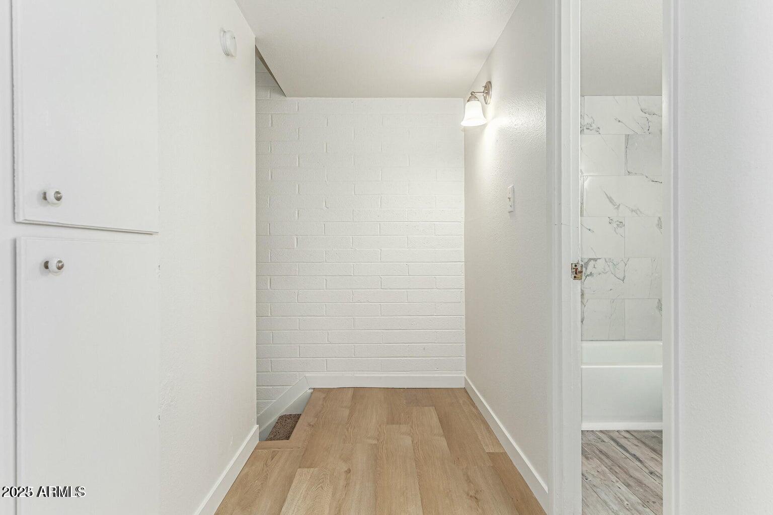 600 South Dobson Road, Unit 69 Mesa, AZ 85202 - Photo 6 of 24 a view of a room with wooden floor