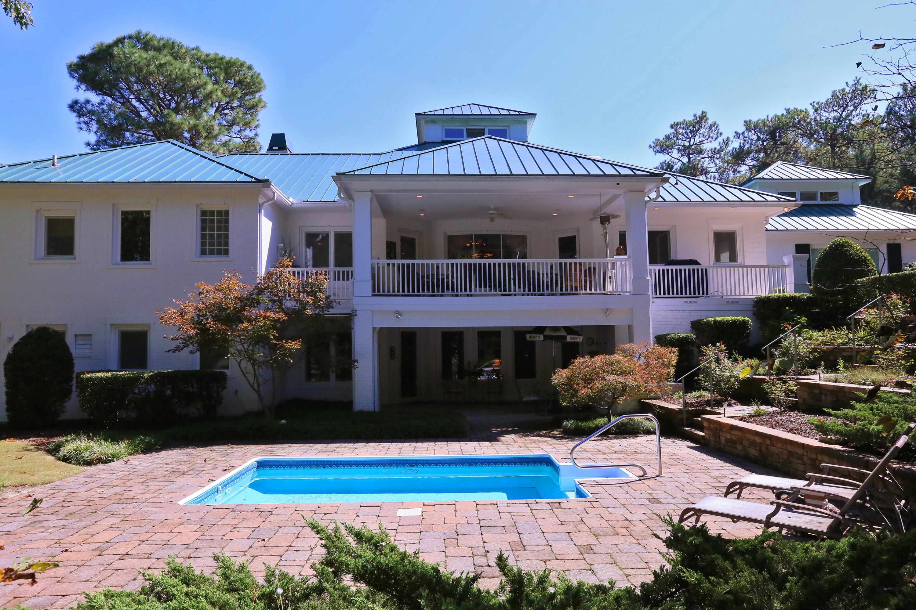 60 Inverrary Road Pinehurst, NC 28374 - Photo 27 of 32 Iron Fenced in Yard, Terrace with Planting Beds