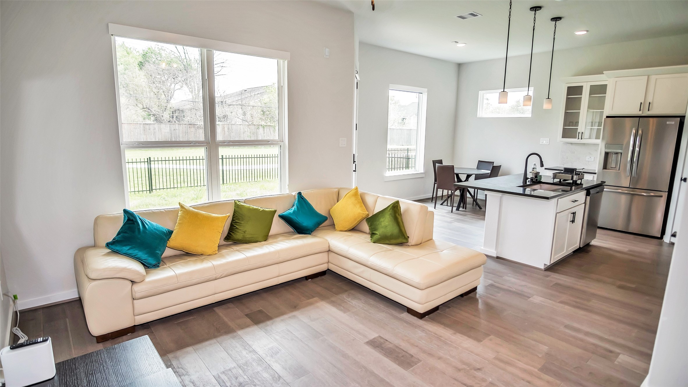 1919 Pueblo Nuevo Path Houston, TX 77077 - Photo 40 of 50 a living room with furniture and a large window