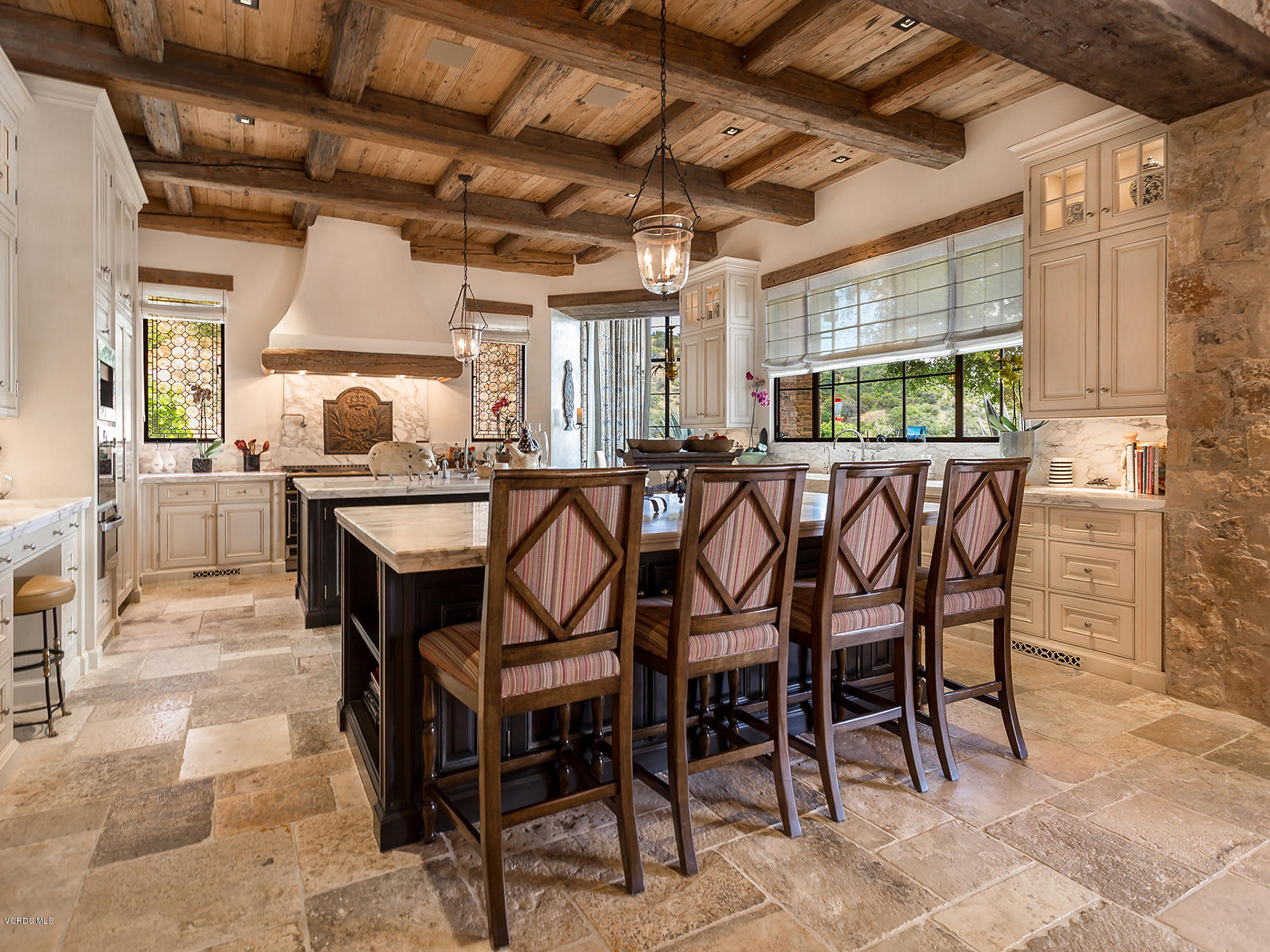 100 West Potrero Road Thousand Oaks, CA 91361 - Photo 12 of 67 a dining room with furniture a chandelier and a rug