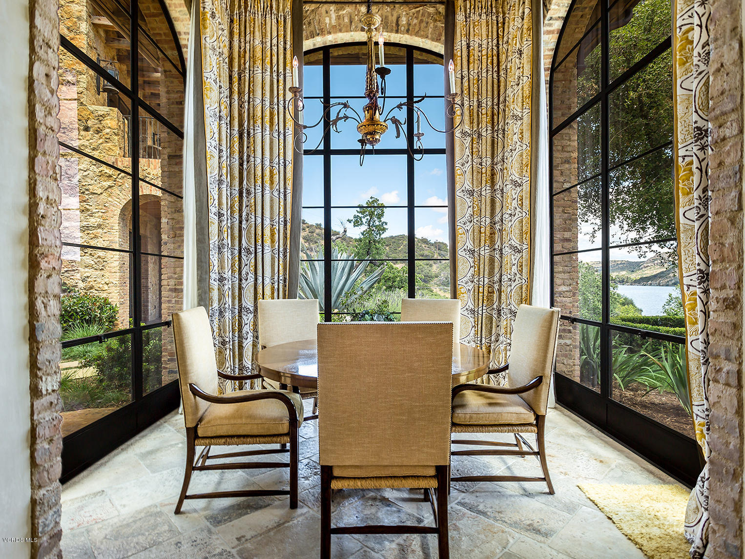 100 West Potrero Road Thousand Oaks, CA 91361 - Photo 14 of 67 a balcony view with a outdoor seating space and a garden