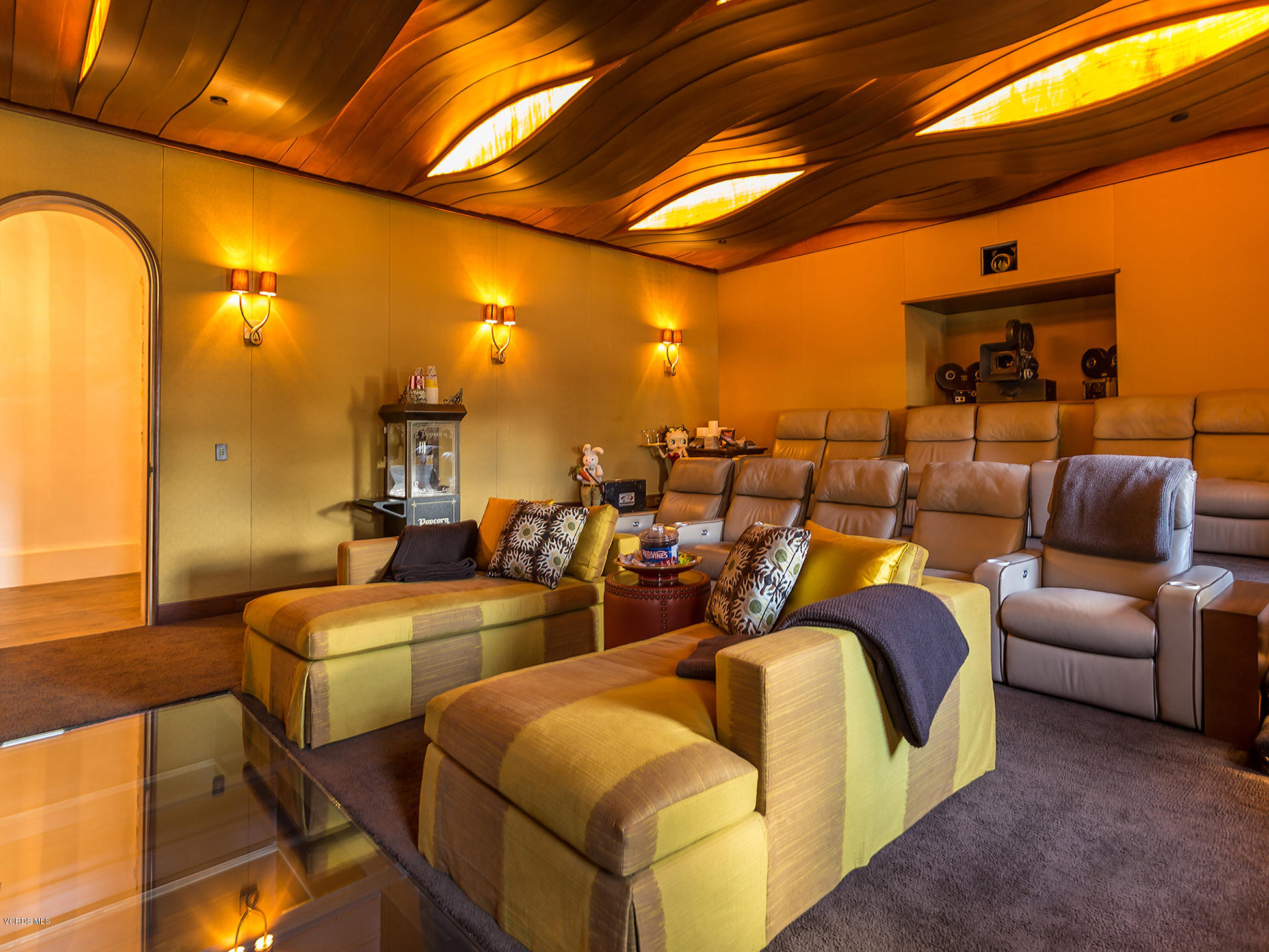 100 West Potrero Road Thousand Oaks, CA 91361 - Photo 23 of 67 a media room with lots of chairs and a projector screen