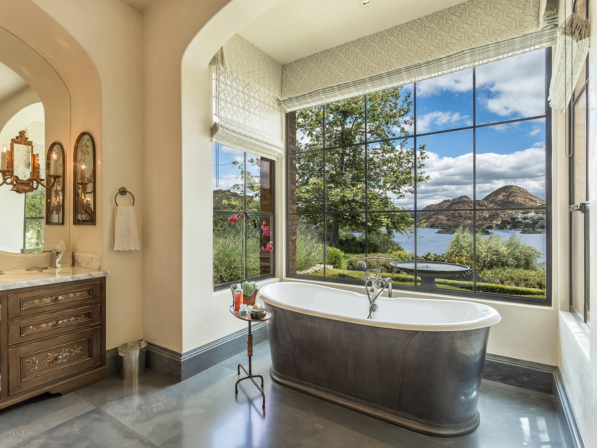 100 West Potrero Road Thousand Oaks, CA 91361 - Photo 29 of 67 a living room with a large window and table