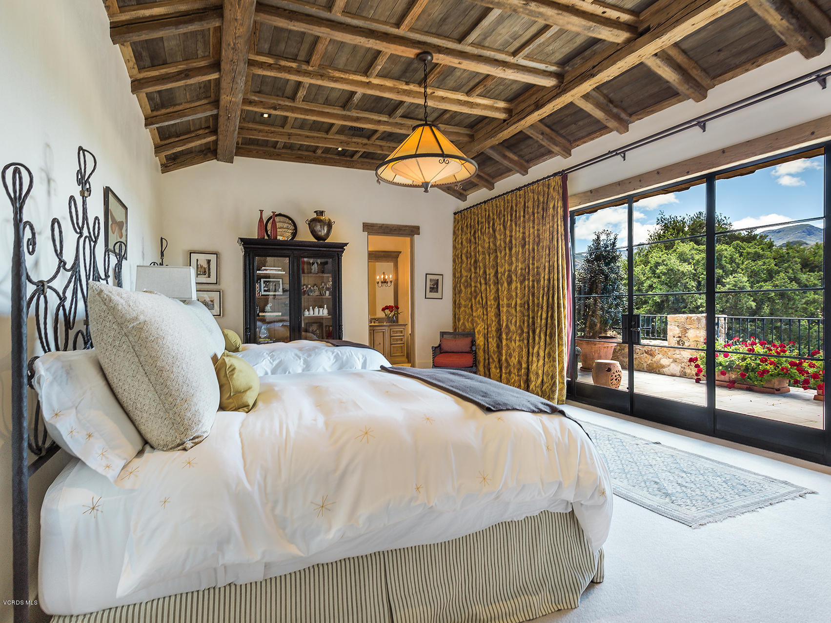 100 West Potrero Road Thousand Oaks, CA 91361 - Photo 32 of 67 a bed sitting in a spacious bedroom next to a window