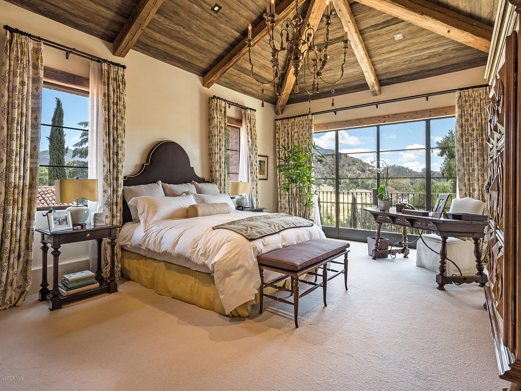 100 West Potrero Road Thousand Oaks, CA 91361 - Photo 36 of 67 a spacious bedroom with a bed and a table
