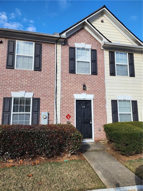3098 Panthers Trace, Unit 63 Decatur, GA 30034 - Photo 1 of 1 a front view of a house with a yard