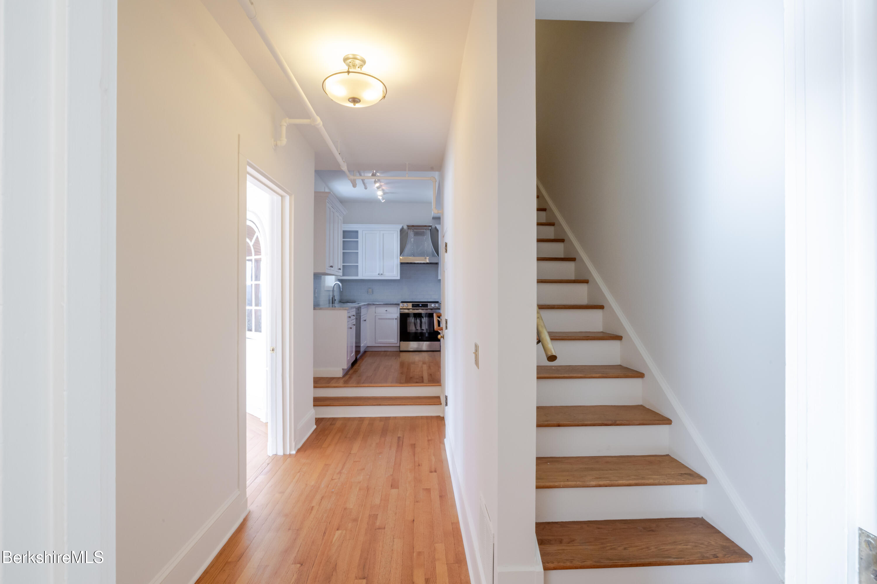 200 Vanna # 3 Old Stockbridge Road Stockbridge, MA 01262 - Photo 15 of 29 a view of entryway and hall with wooden floor