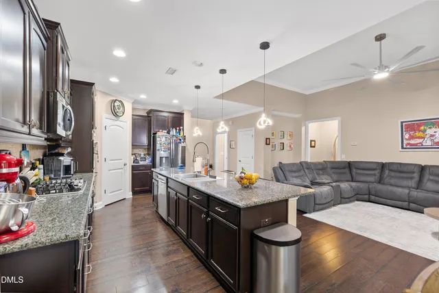 a kitchen with a stove and a microwave
