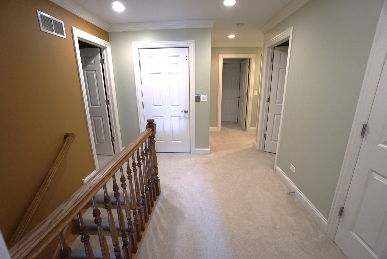8 North Smith Street Palatine, IL 60067 - Photo 22 of 46 a view of a hallway with closet and wooden floor