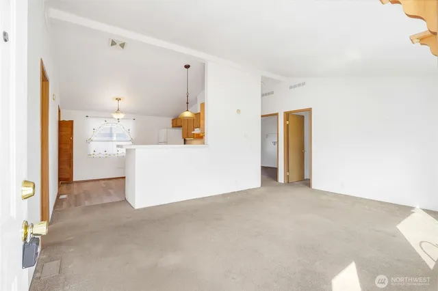 a view of a kitchen with a sink