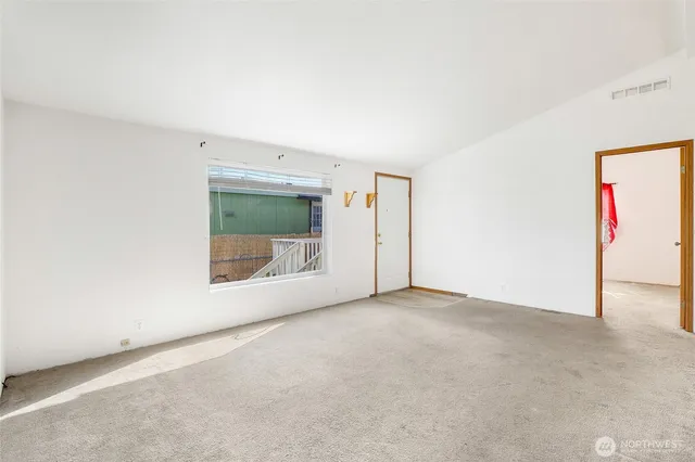 an empty room with a natural light