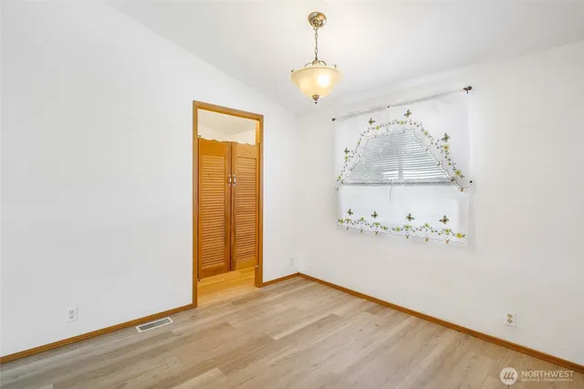 a view of a kitchen counter space and a sink