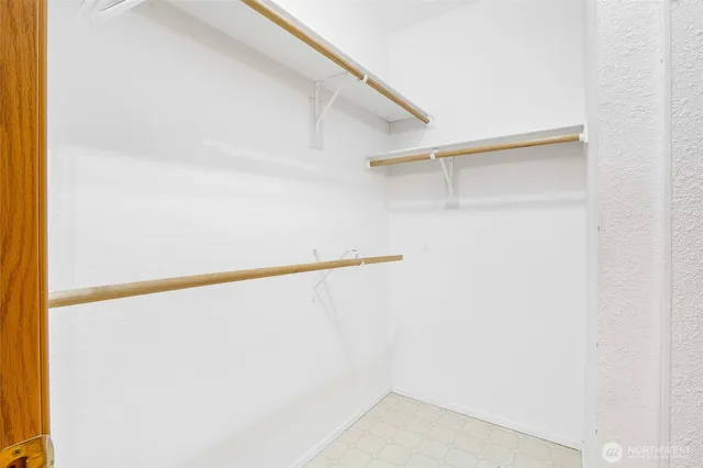 a spacious bathroom with a bathtub shower sink and toilet