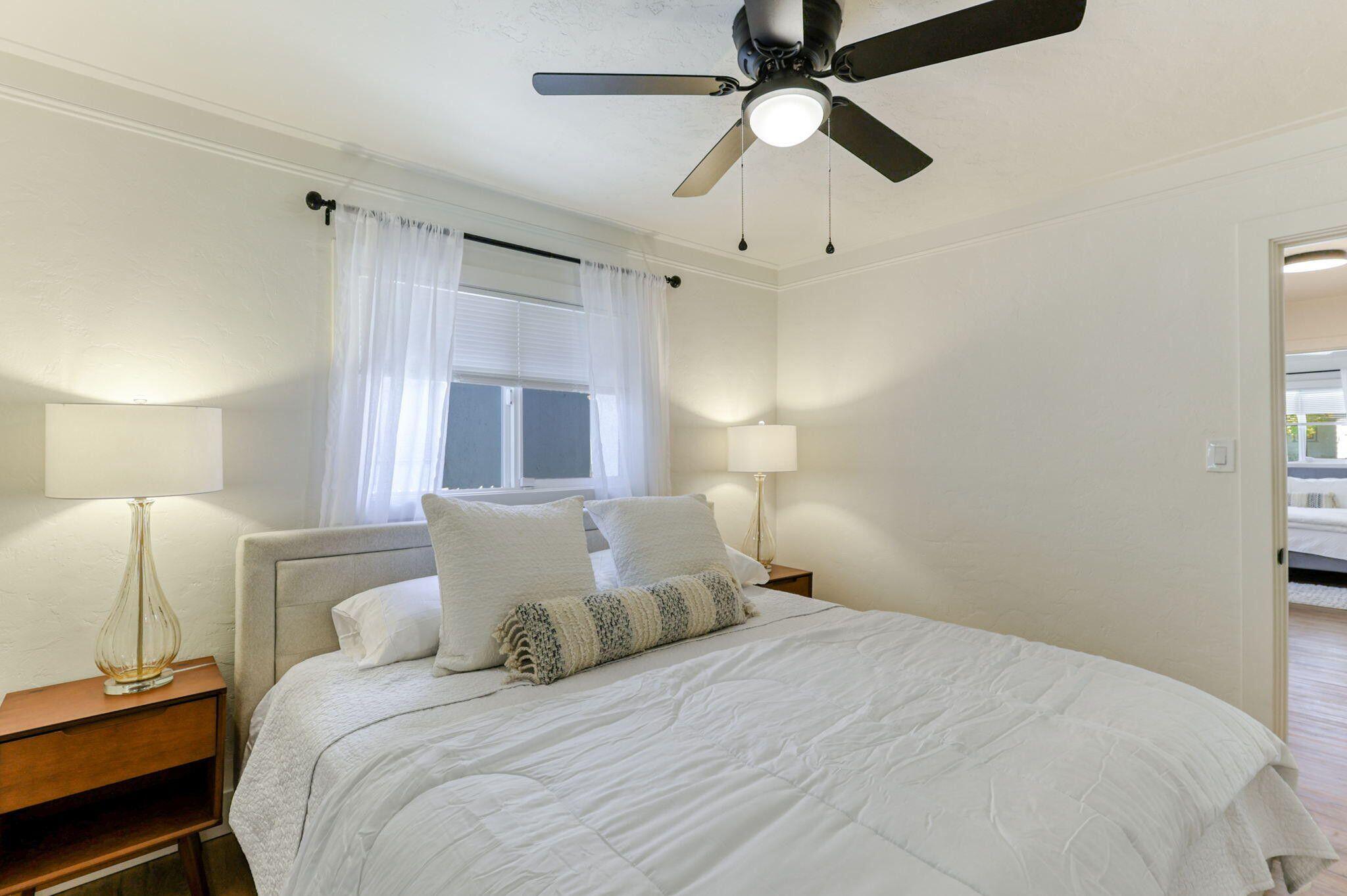 1005 Gold Street Redding, CA 96001 - Photo 14 of 26 a bedroom with a bed and a window