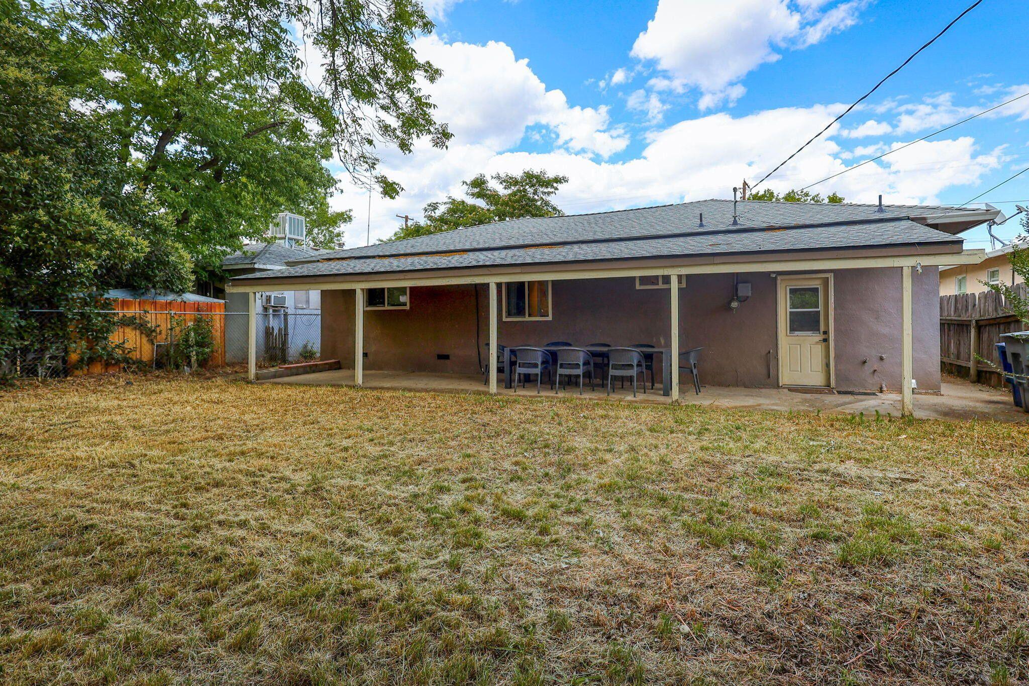 1005 Gold Street Redding, CA 96001 - Photo 24 of 26 a view of a house with a backyard