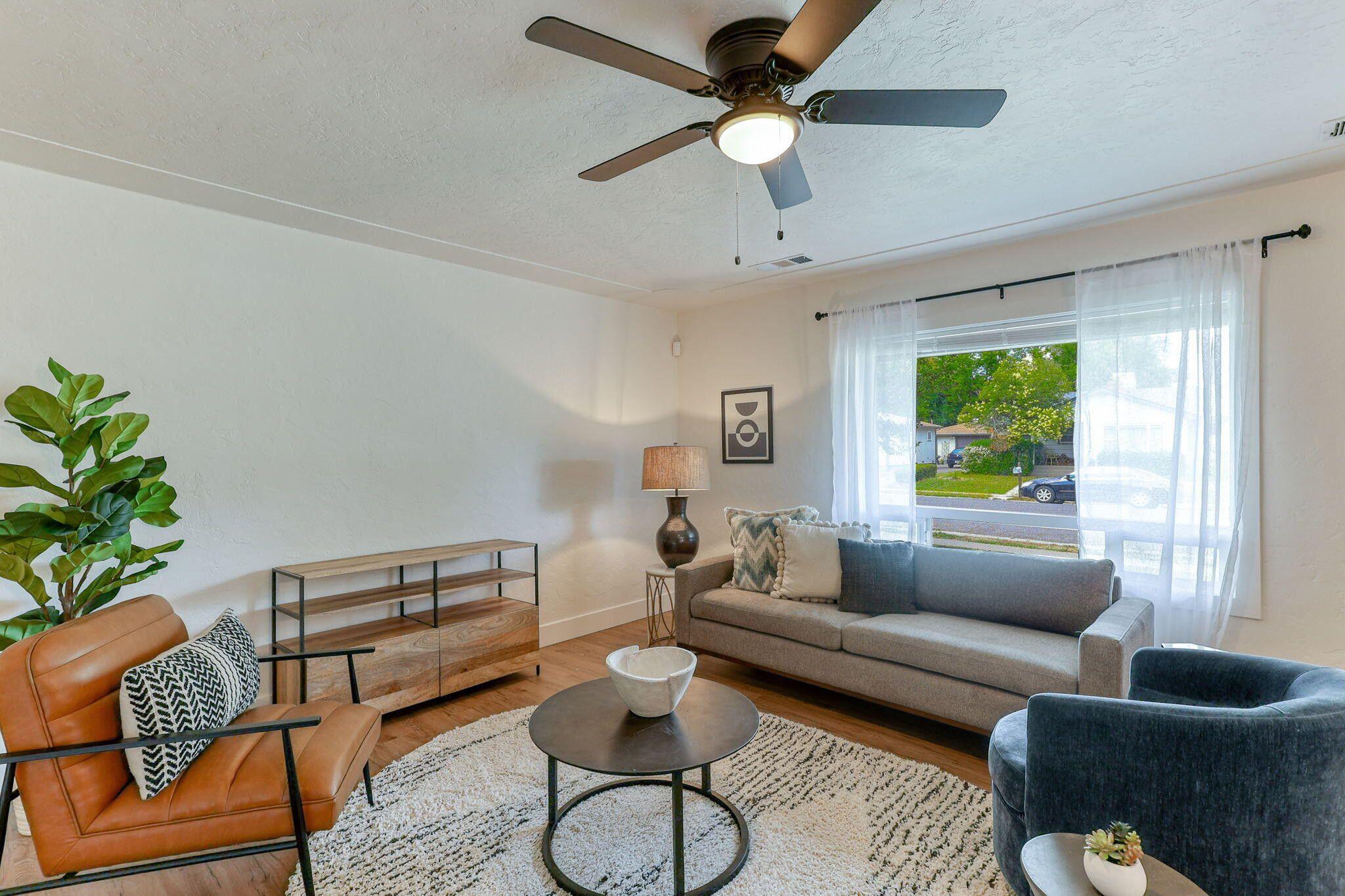 1005 Gold Street Redding, CA 96001 - Photo 5 of 26 a living room with furniture and a large window
