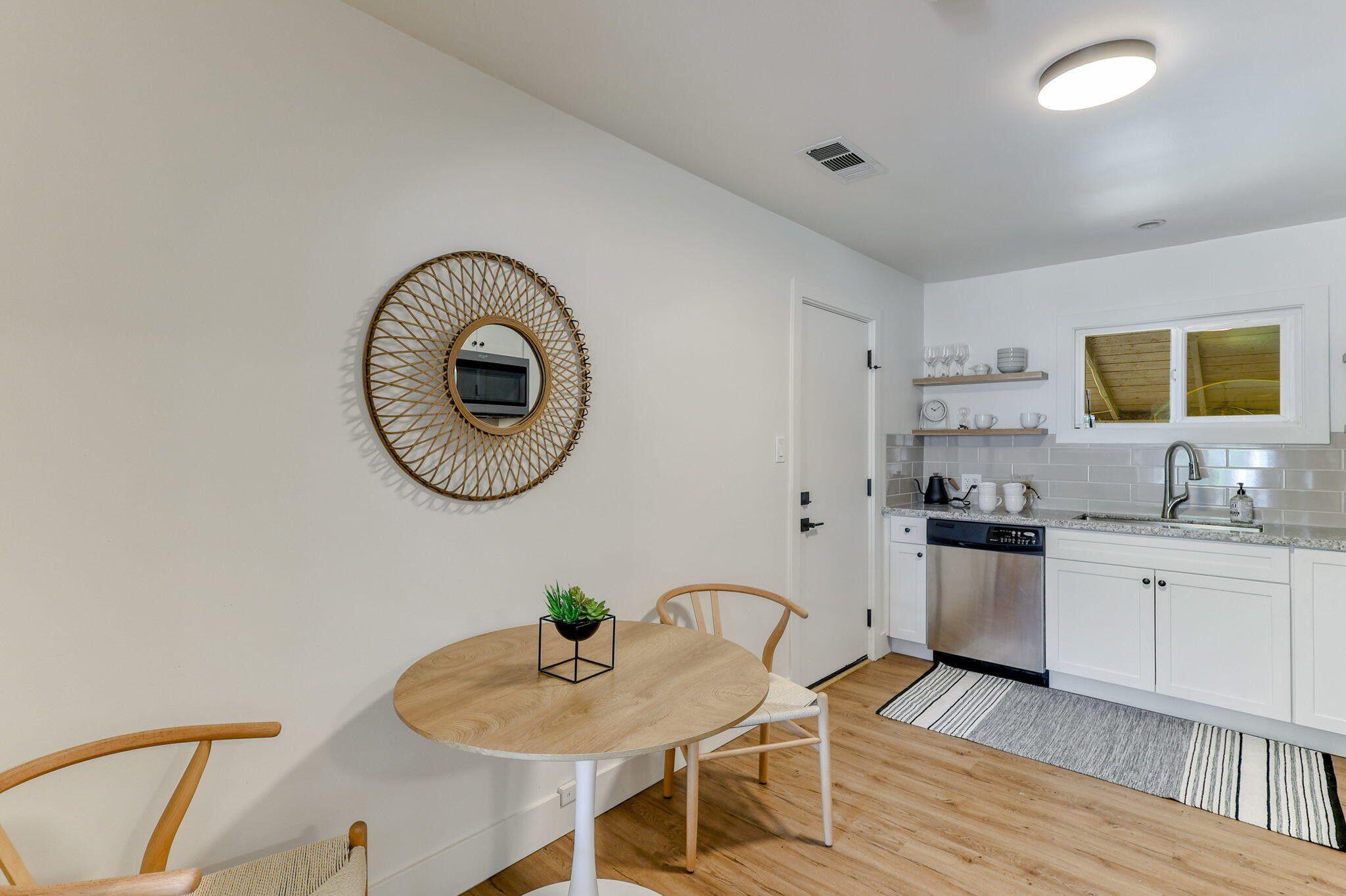 1005 Gold Street Redding, CA 96001 - Photo 9 of 26 a kitchen with a sink cabinets and wooden floor