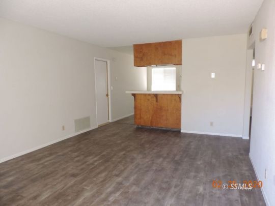 509 Commercial Avenue Ridgecrest, CA 93555 - Photo 2 of 8 an empty room with a window