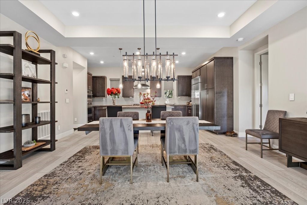 4262 Swift Street Las Vegas, NV 89135 - Photo 14 of 75 Dining area with recessed lighting and light wood-type flooring