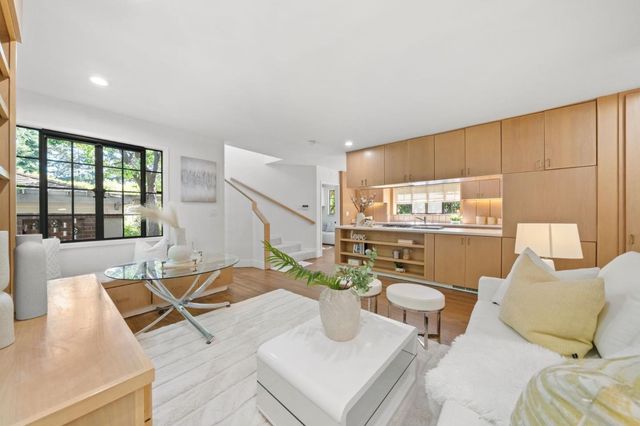 a kitchen with a sink and a window