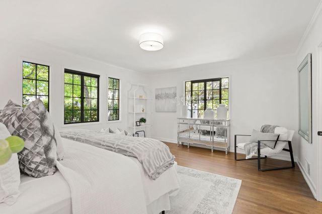 a bathroom with a sink and a window