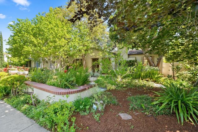 a view of a livingroom with furniture and a window