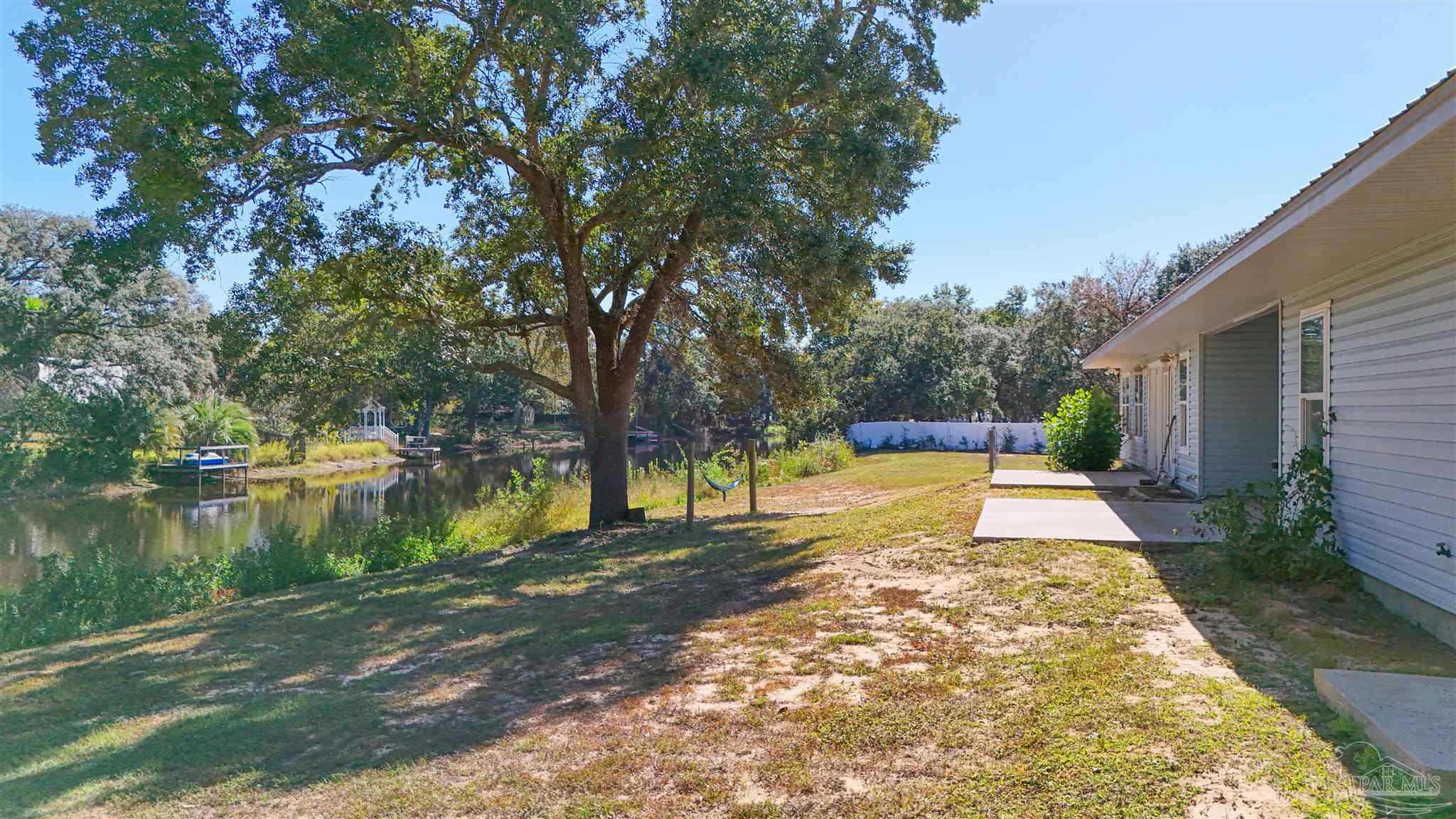 Relax in your hammock on this peaceful oasis!!!!