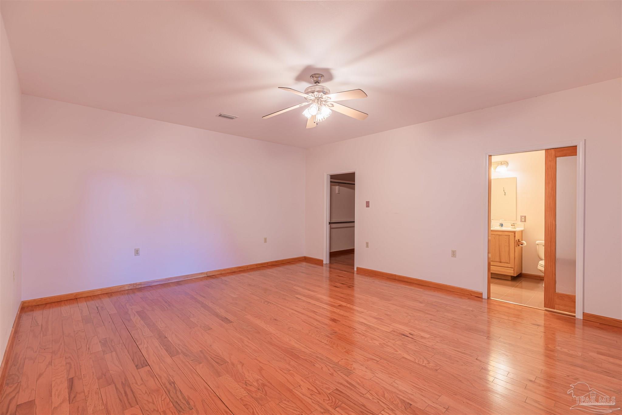 3146 Oakview Drive Milton, FL 32583 - Photo 28 of 50 leads into master bath.