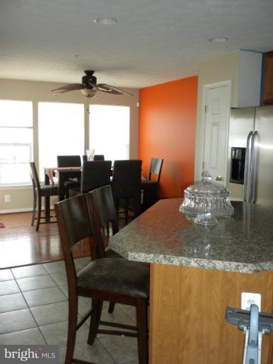 9746 Biggs Road Middle River, MD 21220 - Photo 3 of 13 a view of a dining room with furniture window and outside view