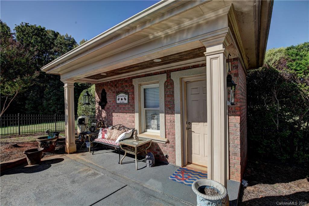 426 Valley Run Road Waxhaw, NC 28173 - Photo 6 of 8 a building outdoor space with patio furniture and potted plants