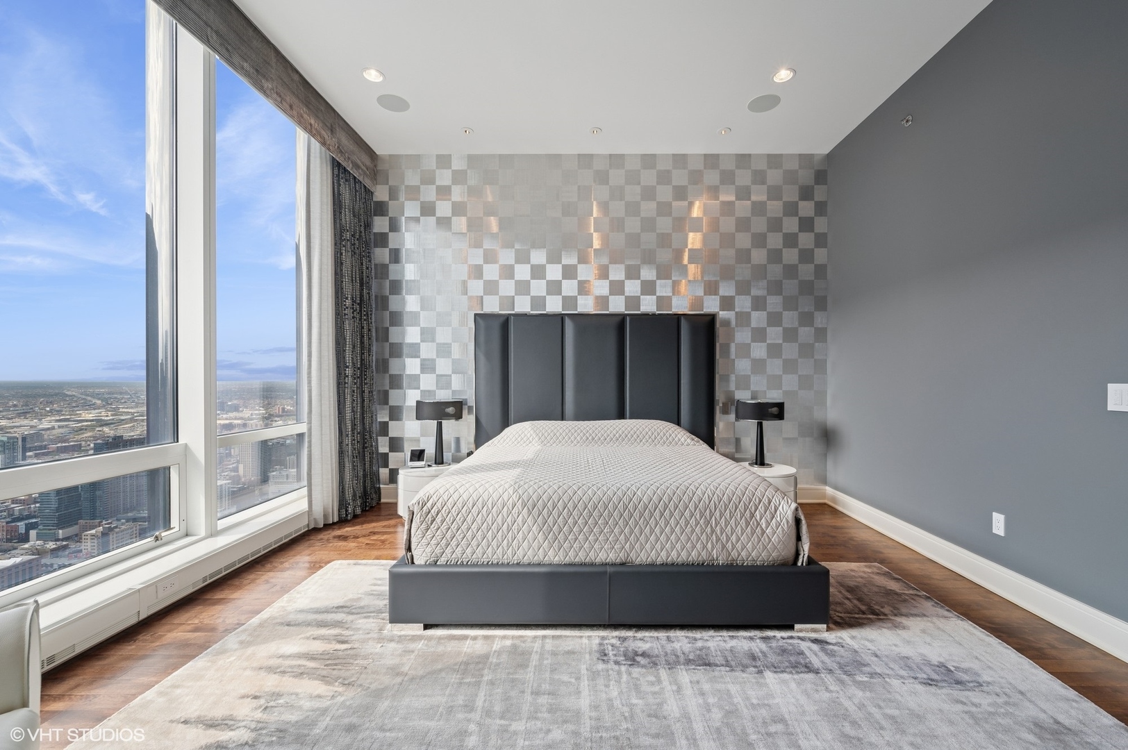 401 North Wabash Avenue, Unit 49G Chicago, IL 60611 - Photo 11 of 60 a bedroom with a large bed and a large window