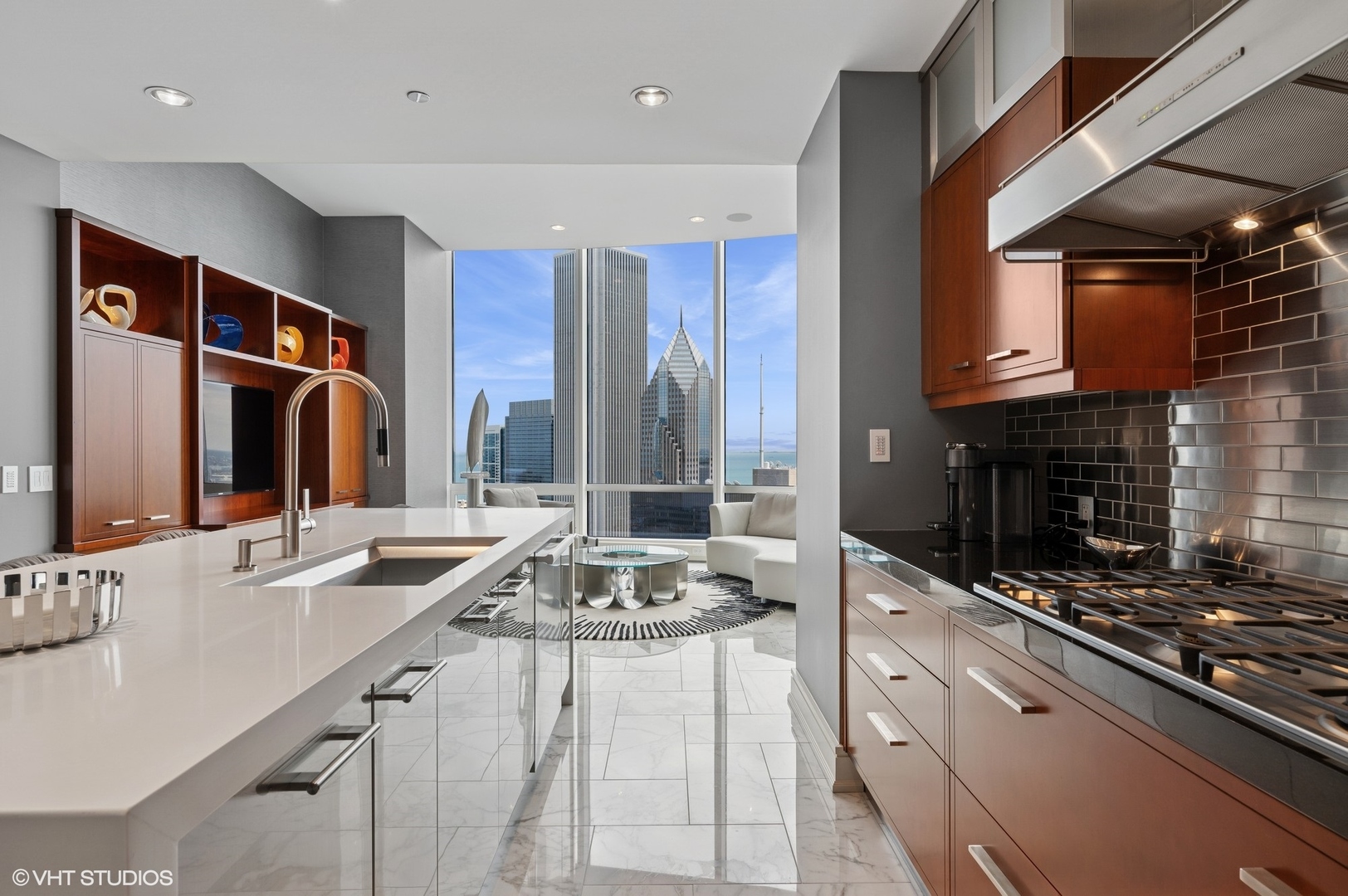 401 North Wabash Avenue, Unit 49G Chicago, IL 60611 - Photo 13 of 60 a kitchen with stainless steel appliances granite countertop a sink stove and cabinets