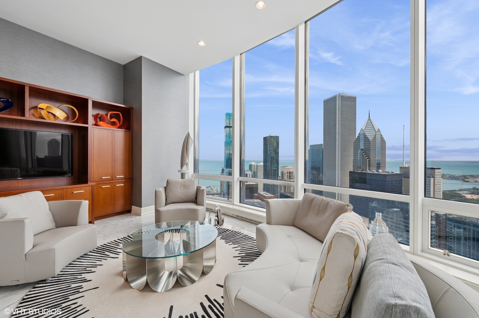 401 North Wabash Avenue, Unit 49G Chicago, IL 60611 - Photo 14 of 60 a living room with furniture and a flat screen tv