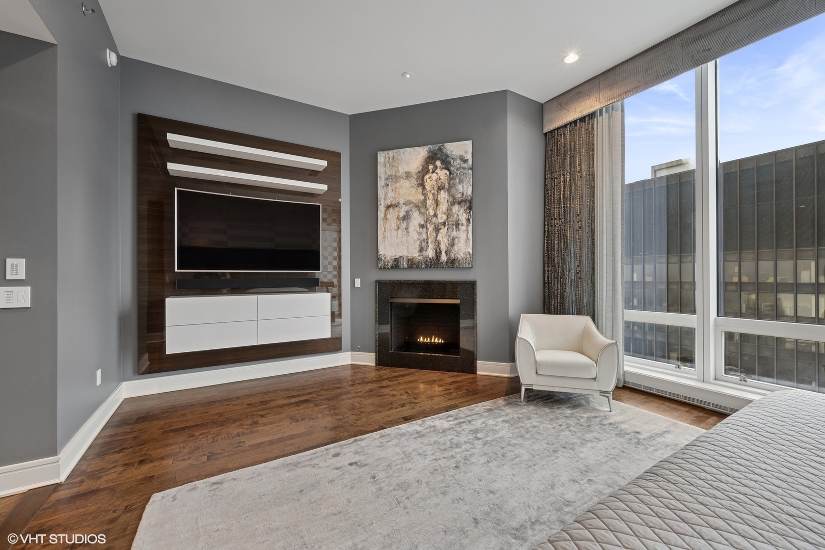 401 North Wabash Avenue, Unit 49G Chicago, IL 60611 - Photo 25 of 60 a living room with furniture and a fireplace