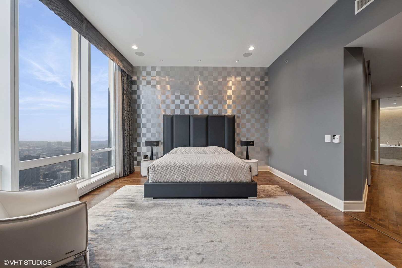 401 North Wabash Avenue, Unit 49G Chicago, IL 60611 - Photo 26 of 60 a living room with a large bed and a large window